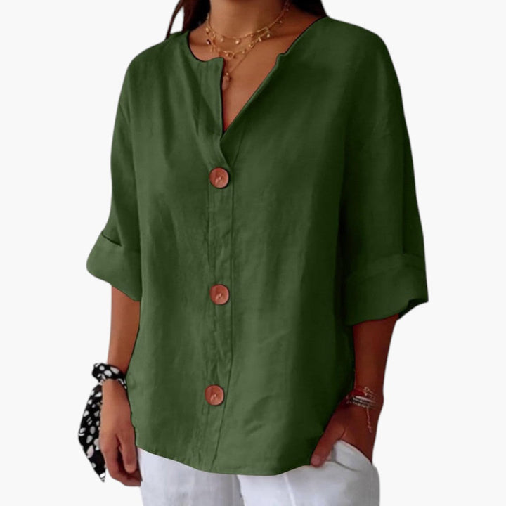 Farverig kvindebluse med bred hals, langærmet, der giver stil og komfort til din alsidige sommergarderobe.