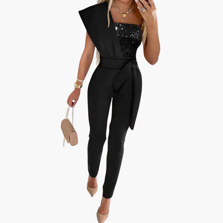 Glitrende kvinde heldragt med en skulder og bindebånd, ideel som elegant aftentøj og festlook.