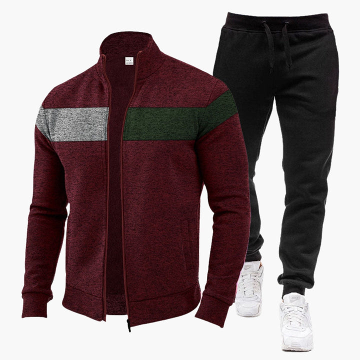 Moderne herre sportstøj med zip sweatshirt og matchende joggerbukser. Ideelt fritidstøj for aktiv livsstil.