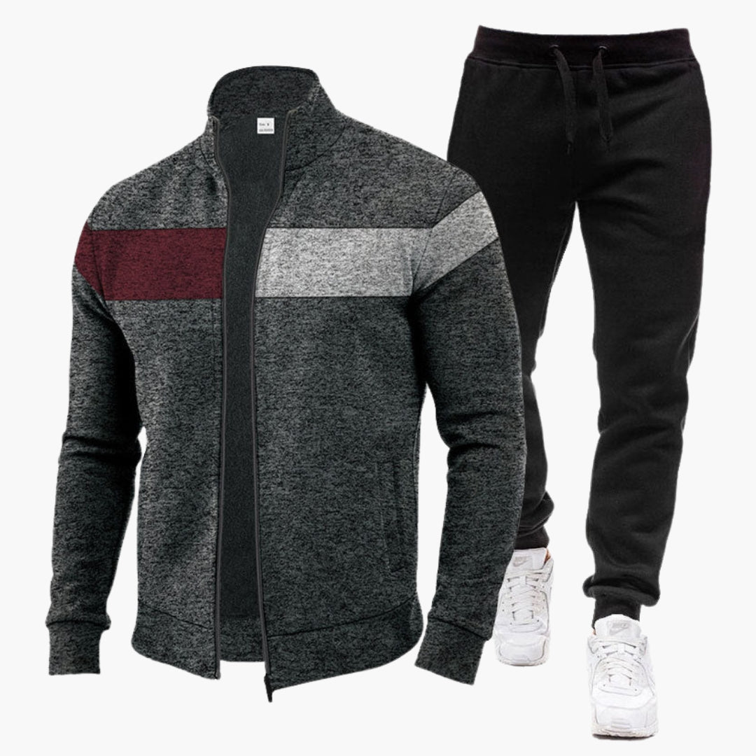 Stilfuldt herre træningssæt med højhalset zip-sweatshirt og komfortable joggerbukser. Perfekt til sport og fritid.