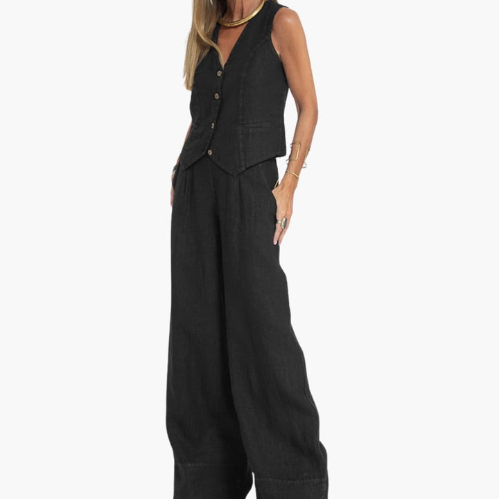 Elegant todelt sæt til kvinder med vest og brede bukser. Ideel til afslappet sommerstil.
