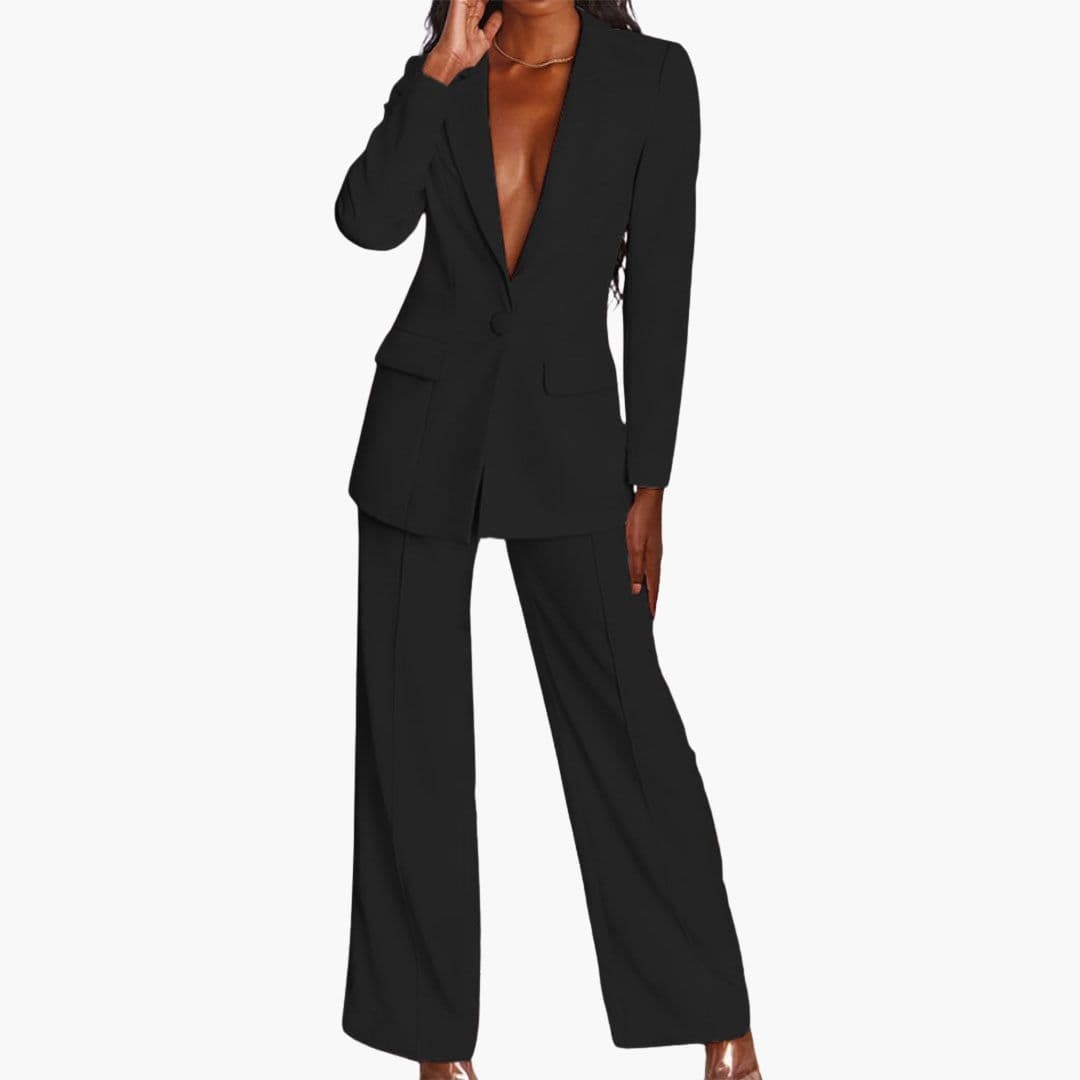 Klassisk to-delt sæt til damer, med skræddersyet blazer og brede ben bukser. Elegant look.