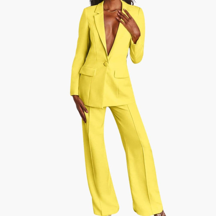 Elegant to-delt sæt til kvinder: blazer og brede bukser. Ideel til kontor eller fest.