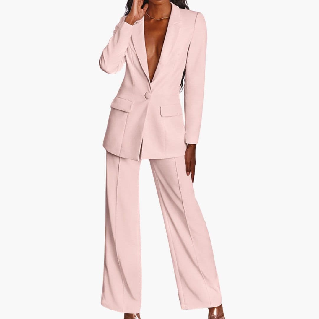 Kvindesæt med matchende blazer og brede bukser. Perfekt til en sofistikeret og moderne stil.
