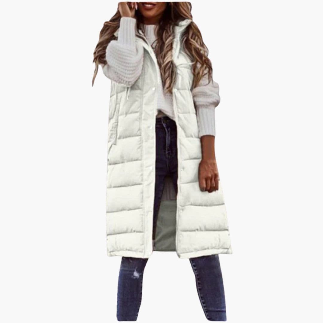 Moderne lang hættevest til kvinder. Quiltet design giver både stil og varme.