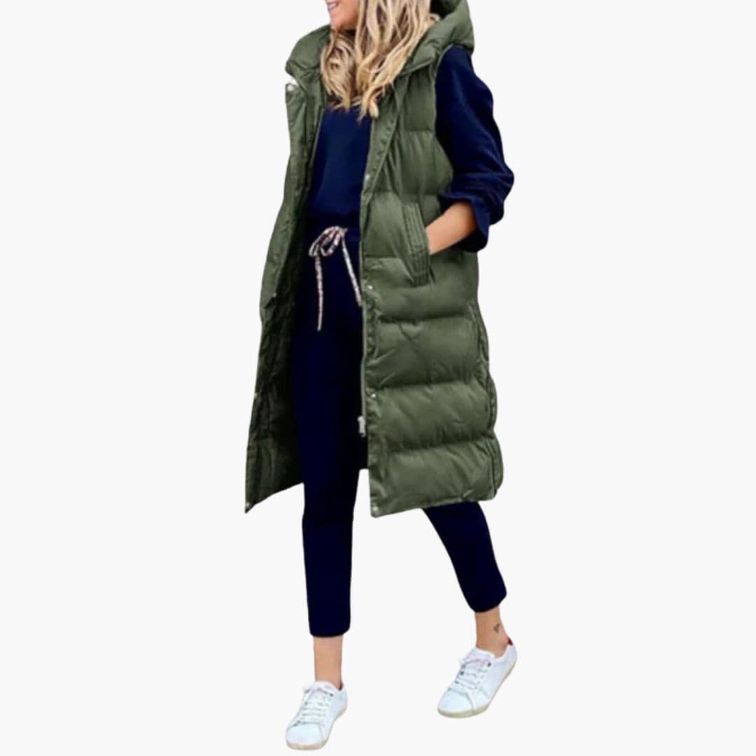 Lang quiltet damegilet med hætte. Klassisk overtøj til efterår & vinter.