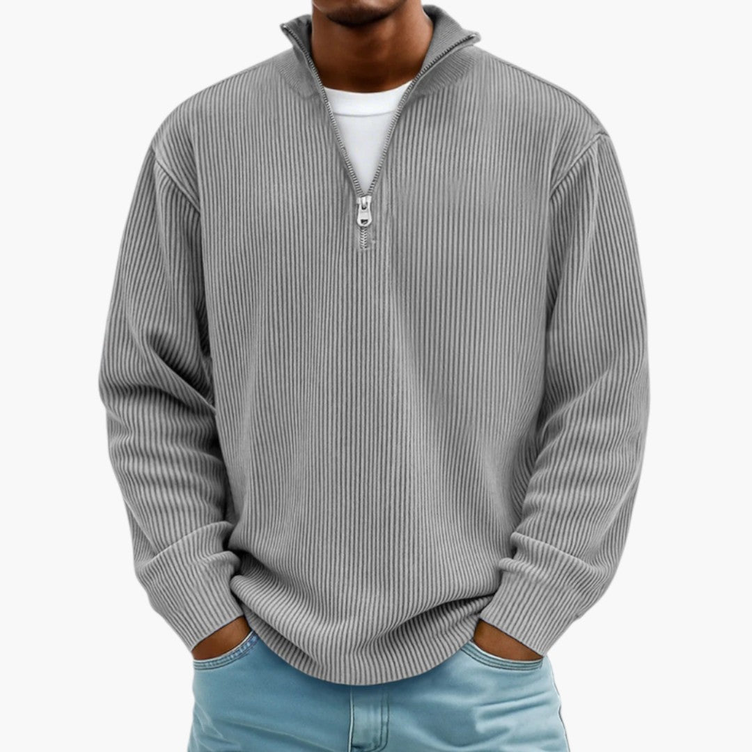 Klassisk herresweater med lynlåskrave. Perfekt til afslappede dage og overgangsperioder.