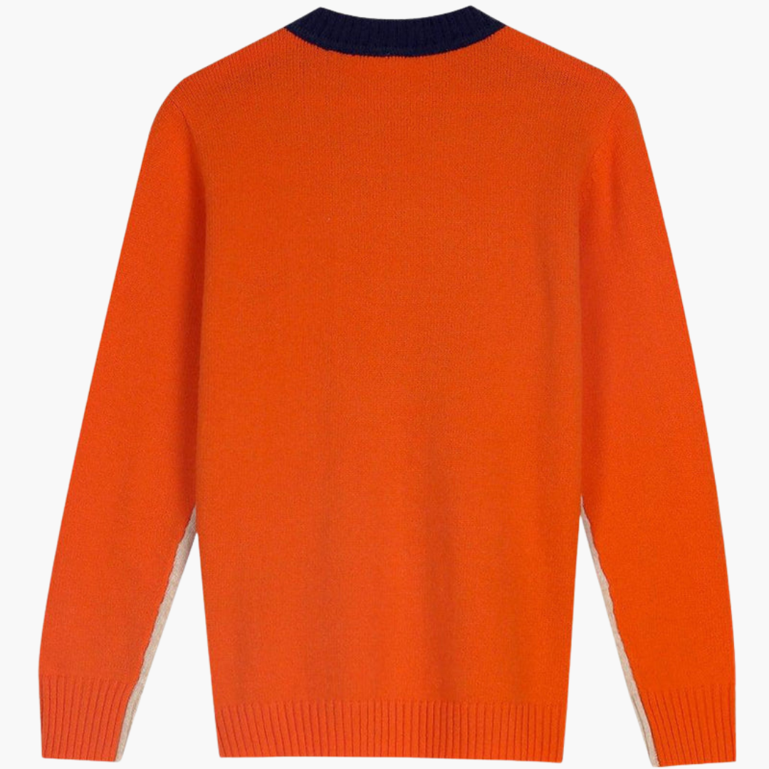 Moderne striktrøje til kvinder. Marineblå med stilfulde kontrastærmer og klassisk rund hals. Ideel til modebevidste.