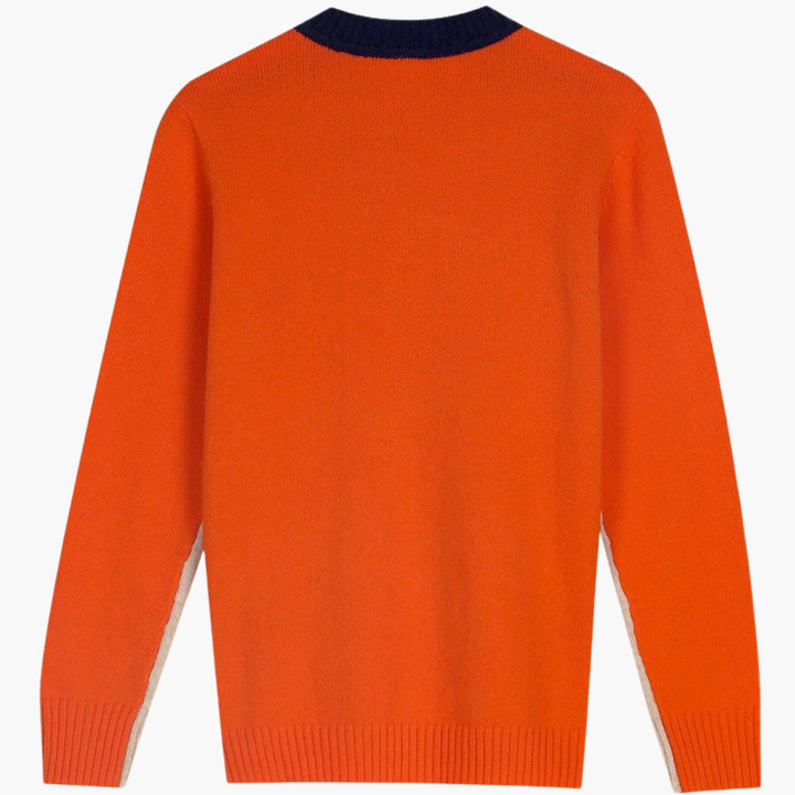 Moderne striktrøje til kvinder. Marineblå med stilfulde kontrastærmer og klassisk rund hals. Ideel til modebevidste.