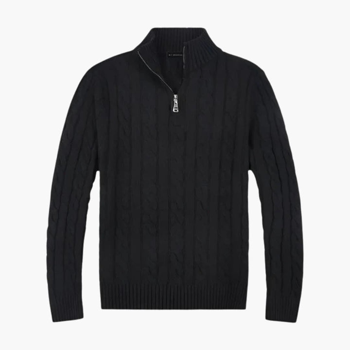 Detaljeret mænds striktrøje med snoet design og praktisk halv-zip lukning. Klassisk herremode.
