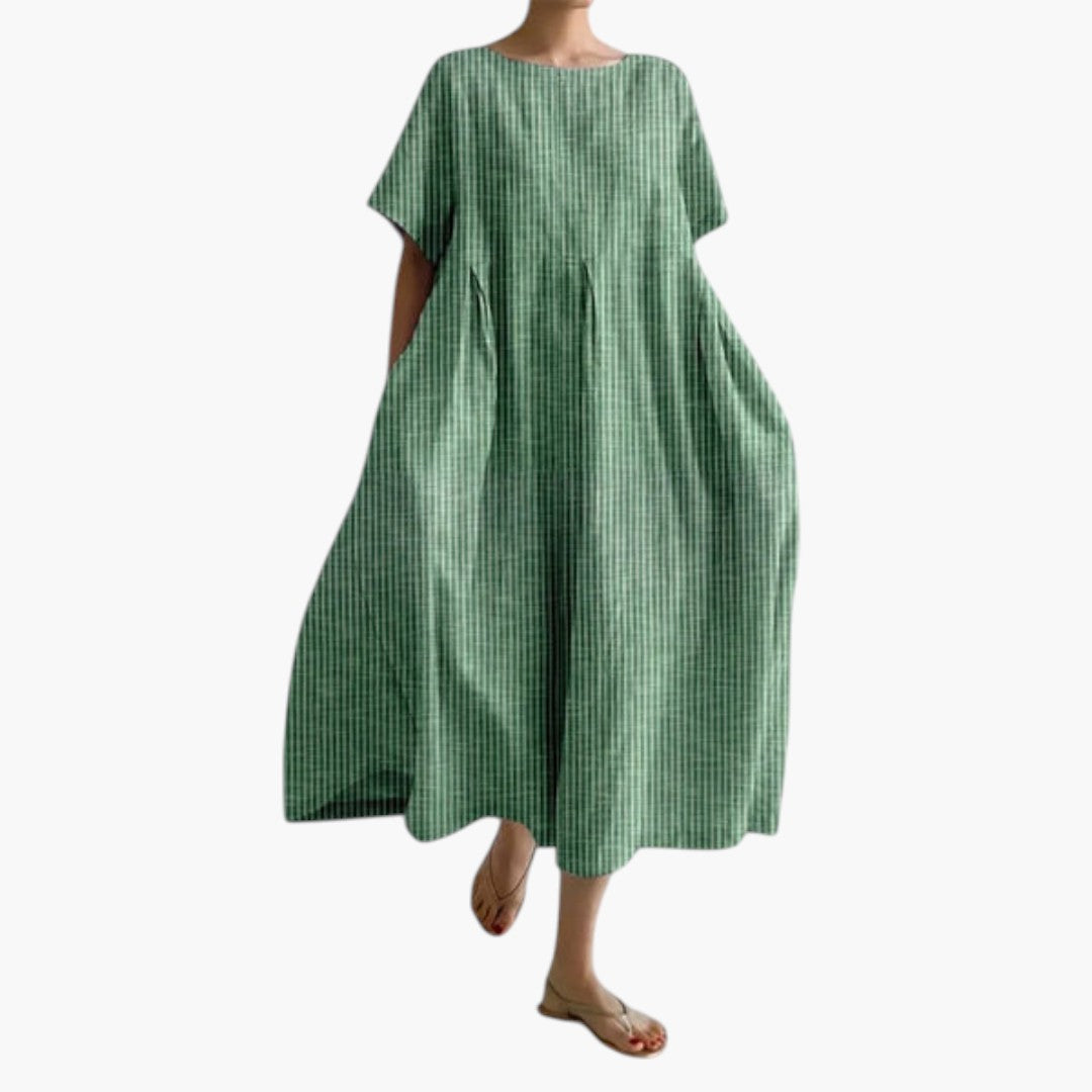 Sommer maxikjole til kvinder med plisseret talje, sidelommer og elegant snit; ideel til hverdag.