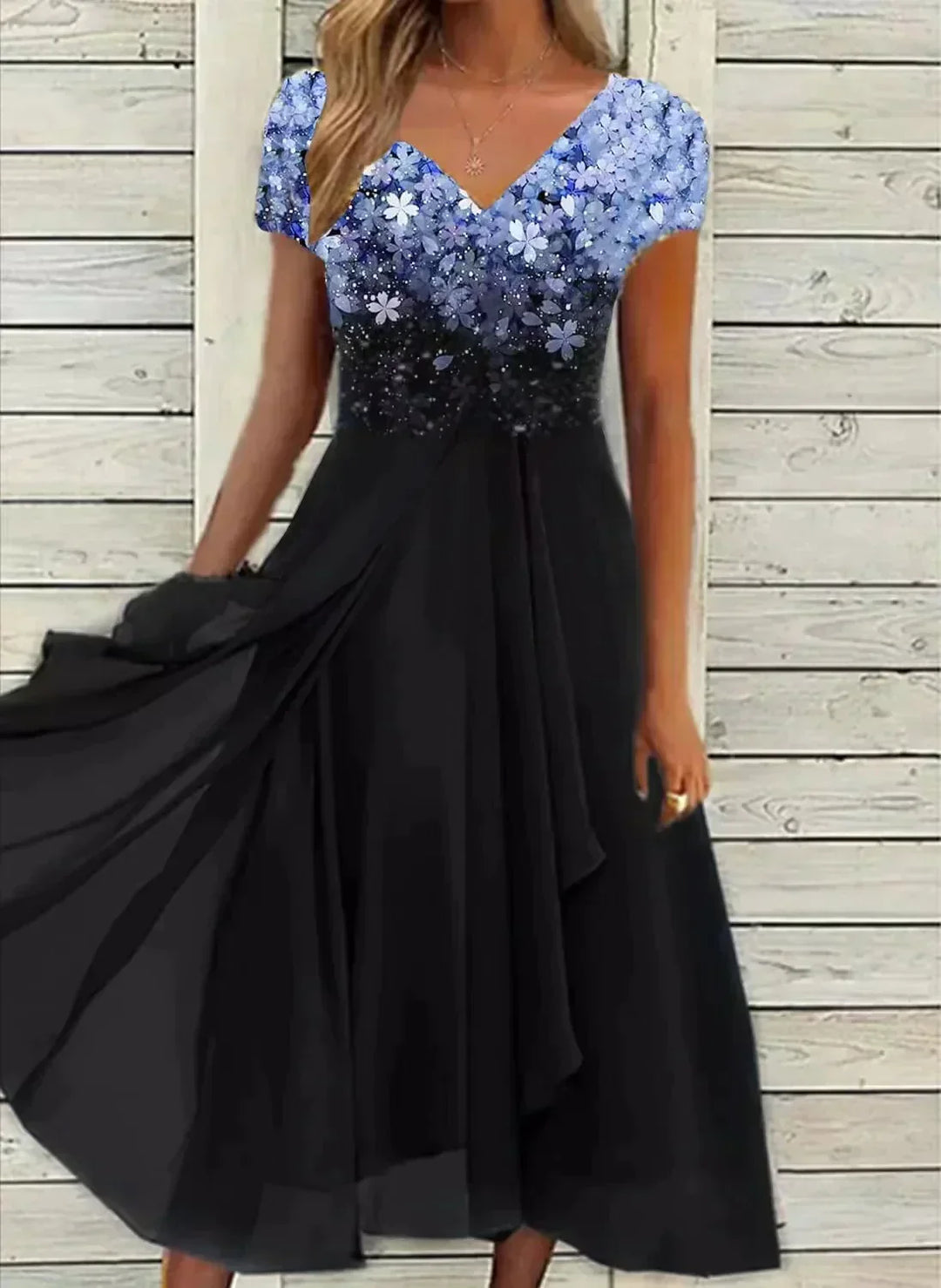 Elegant dame midi kjole med blomsterprint, V-hals og korte ærmer, perfekt til sommerfester.