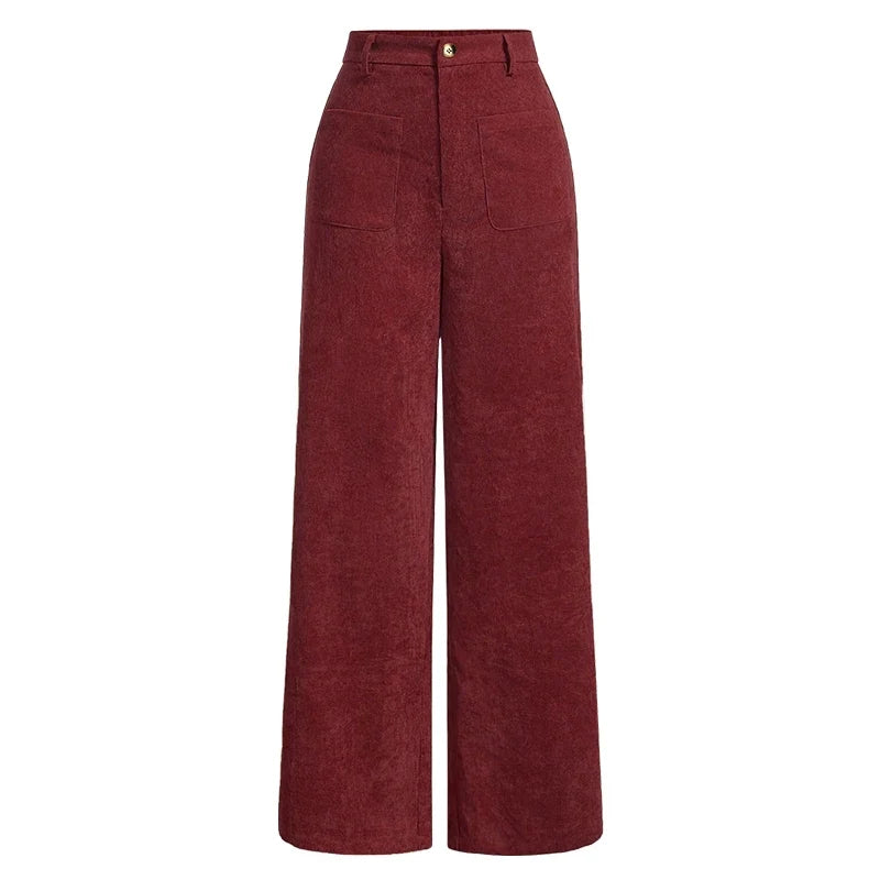 Detaljebillede af høj talje og stilfulde knapper på komfortable damejeans med praktiske lommer.