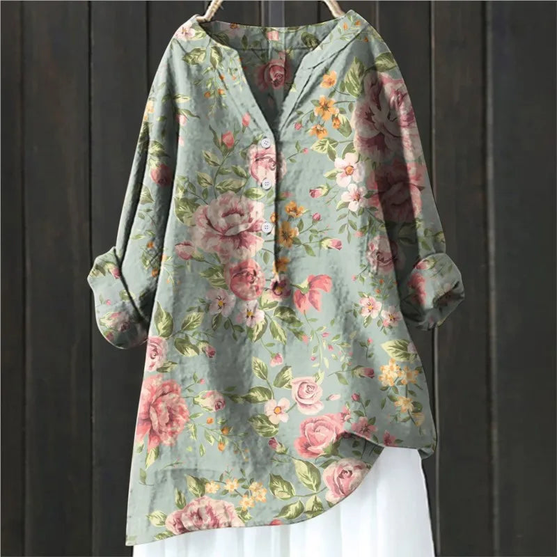 Kvinder's elegante skjortekjole. Midikjole med blomsterprint i let bomuld-hør, ideel til sommer.