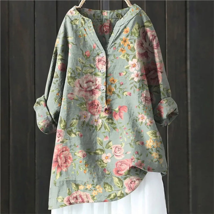 Kvinder's elegante skjortekjole. Midikjole med blomsterprint i let bomuld-hør, ideel til sommer.