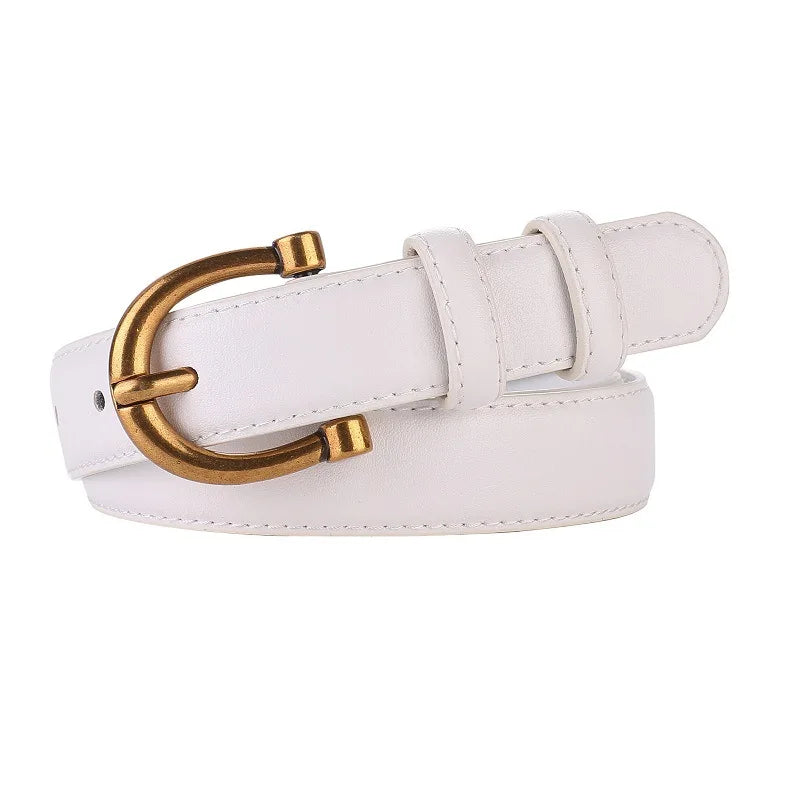 Guldbælte til kjole, slankt og moderne design med elegant spænde for en feminin silhuet.