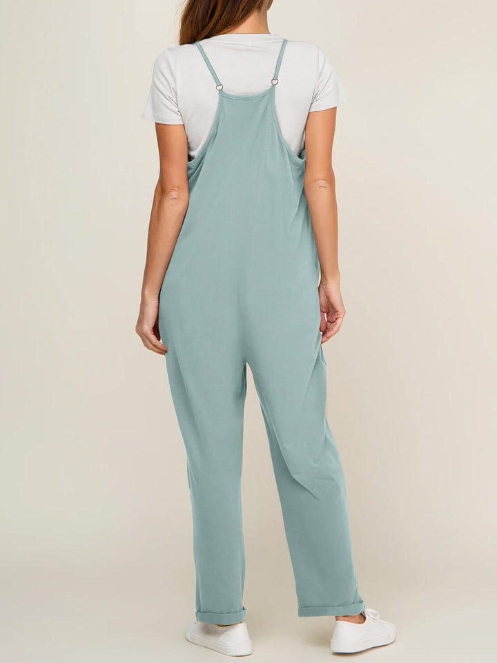 Komfortabel kvinders jumpsuit med elastisk talje, ideel til lange dage.