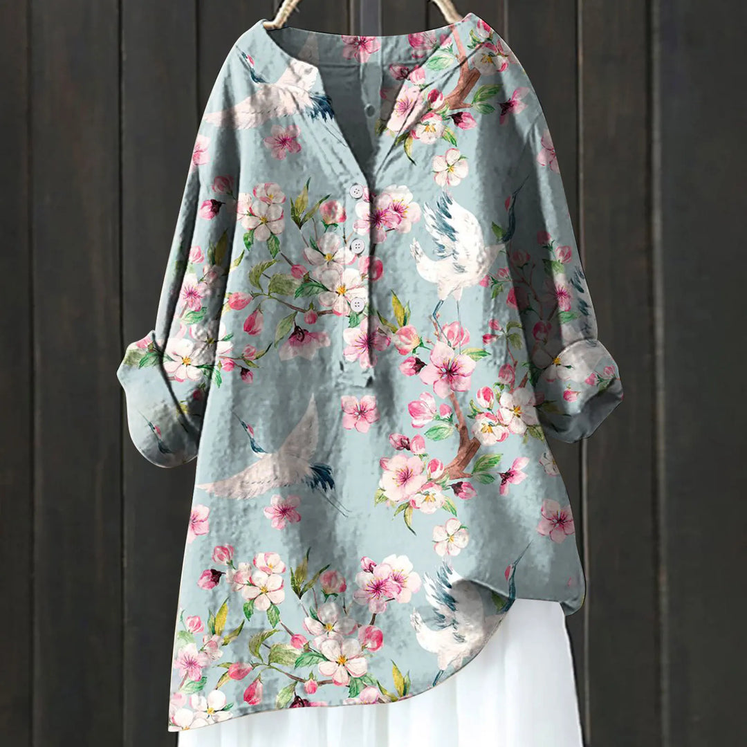 Alsidig hverdagskjole til kvinder. Blomstret midikjole i bomuld-hør, elegant og komfortabel til sommer.