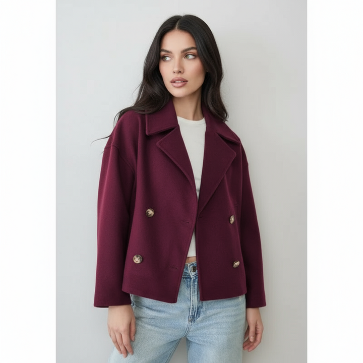 Stilfuld cropped damejakke i elegant snit med dobbeltknap design. Komfortabel, chic og kort model.
