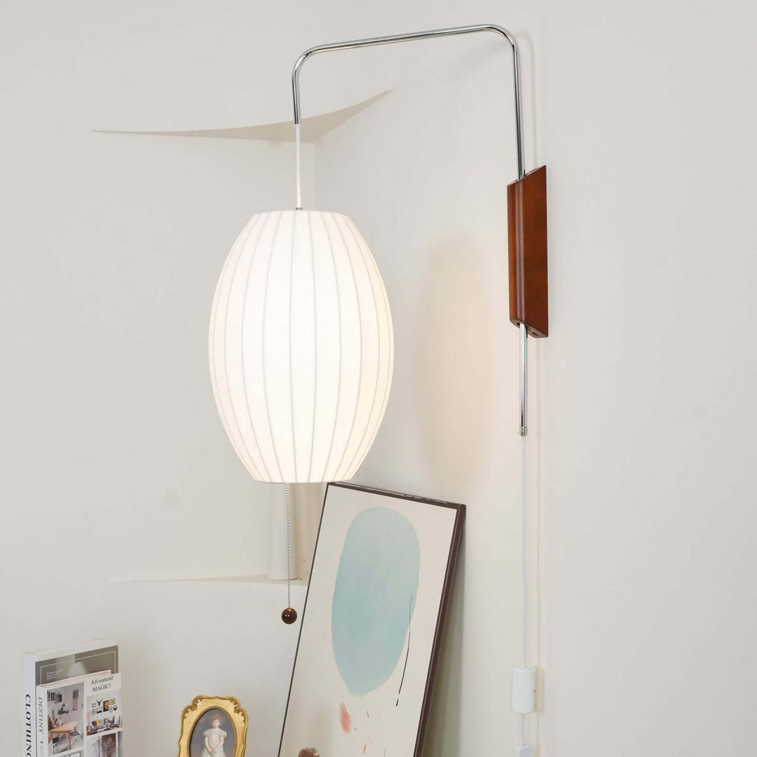 Moderne væglampe med kugledesign og varmt hvidt lys