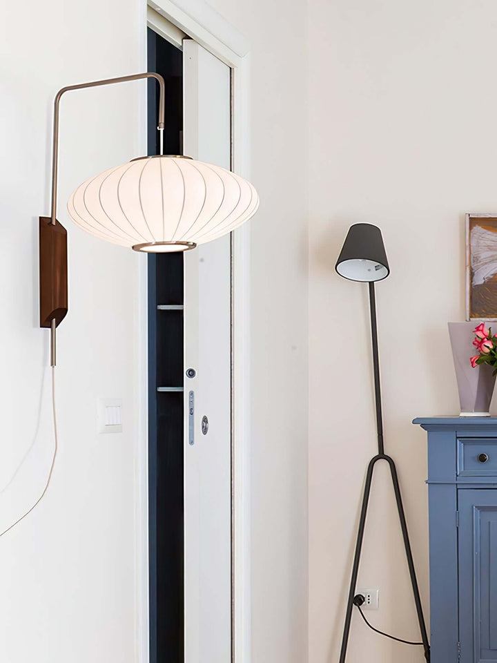 Moderne væglampe med kugledesign og varmt hvidt lys