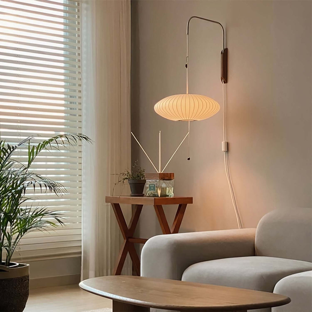 Moderne væglampe med kugledesign og varmt hvidt lys