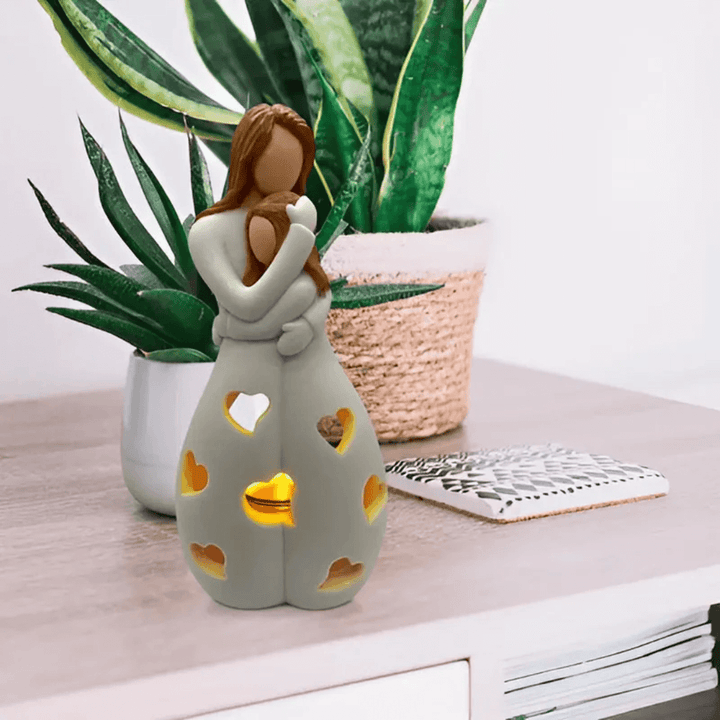 Mor og datter lysestage skulptur