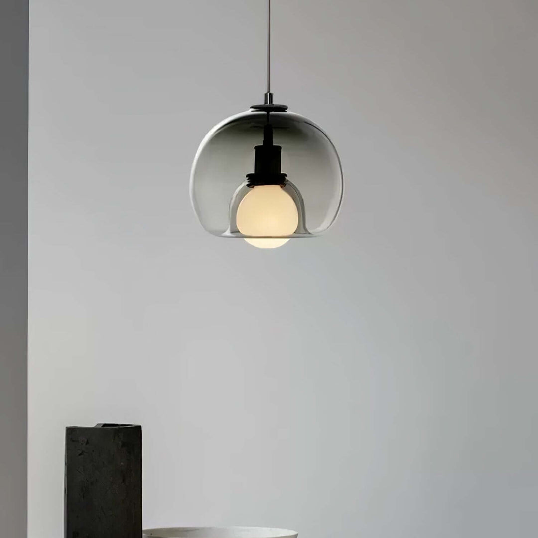 Moderne pendellampe i metal og glas