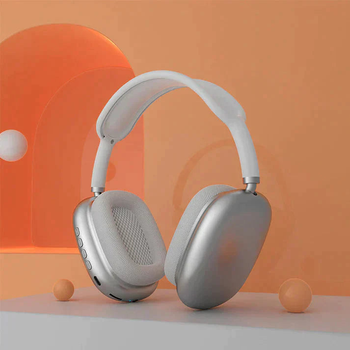 Sølv AeroBeats trådløse hovedtelefoner med HiFi-lyd, perfekt til rejser og effektiv støjreduktion.
