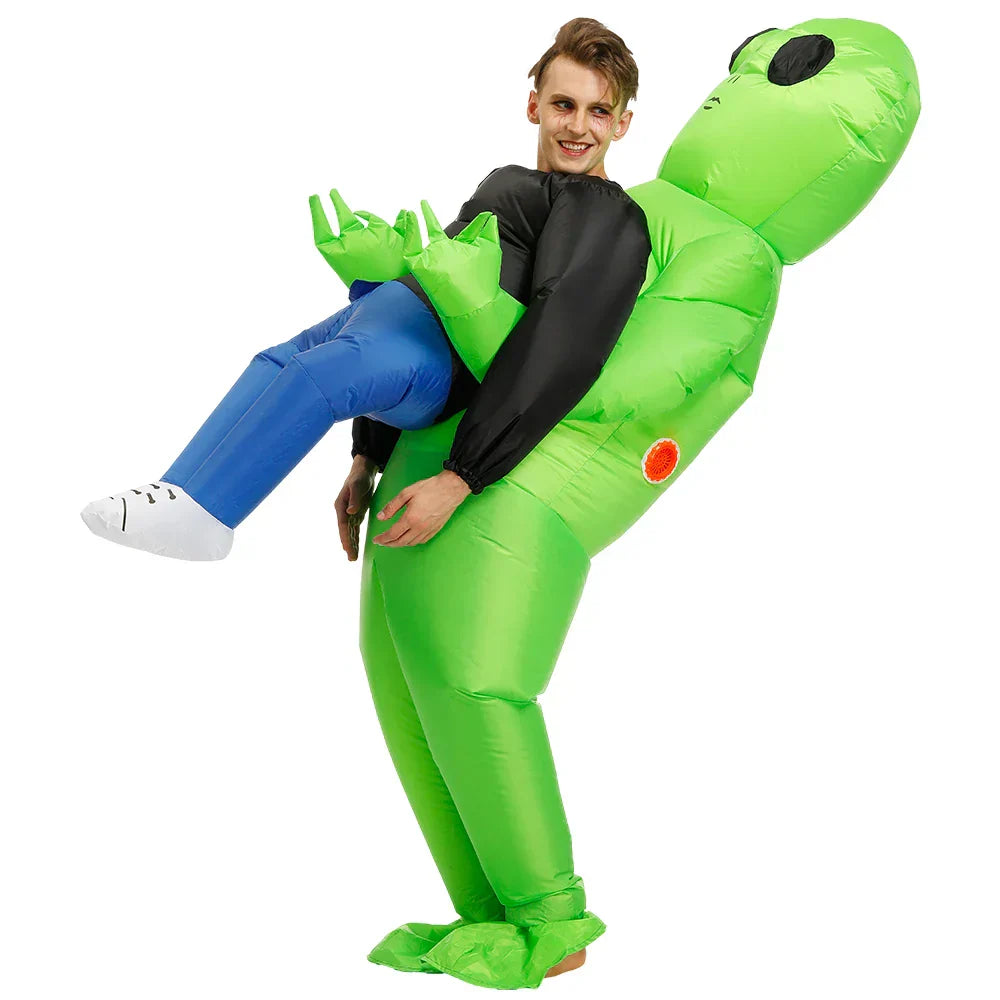 Oppusteligt grønt rumvæsenkostume til børn og voksne, humoristisk design til fester, let og hurtigt at puste op.