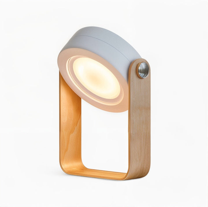 Stilren, dæmpbar LED bordlampe i nordisk design. Genopladelig trådløs lampe skaber hyggelig stemning.