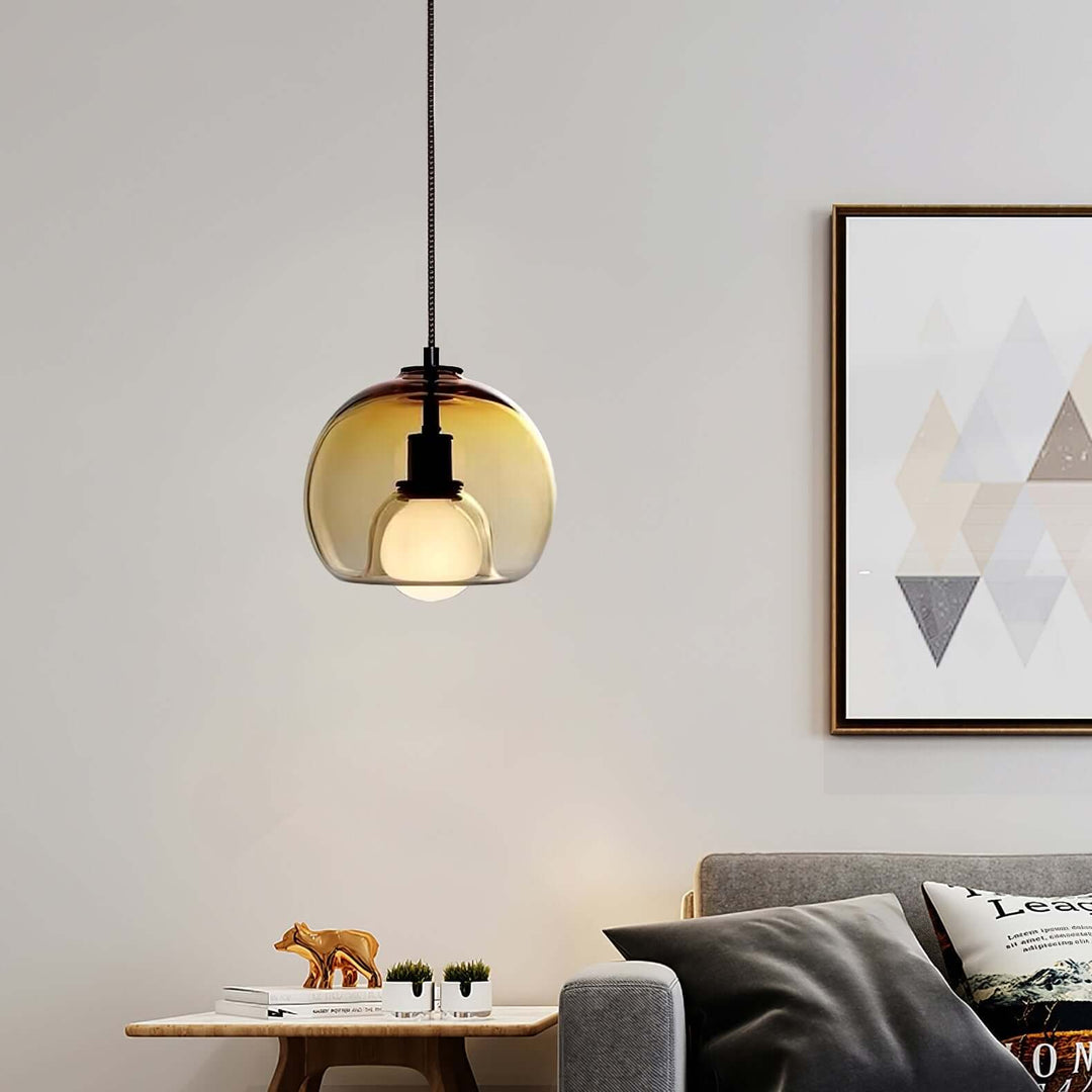 Moderne pendellampe i metal og glas
