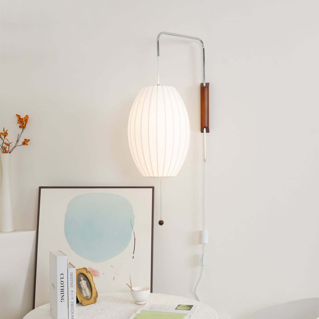 Moderne væglampe med kugledesign og varmt hvidt lys