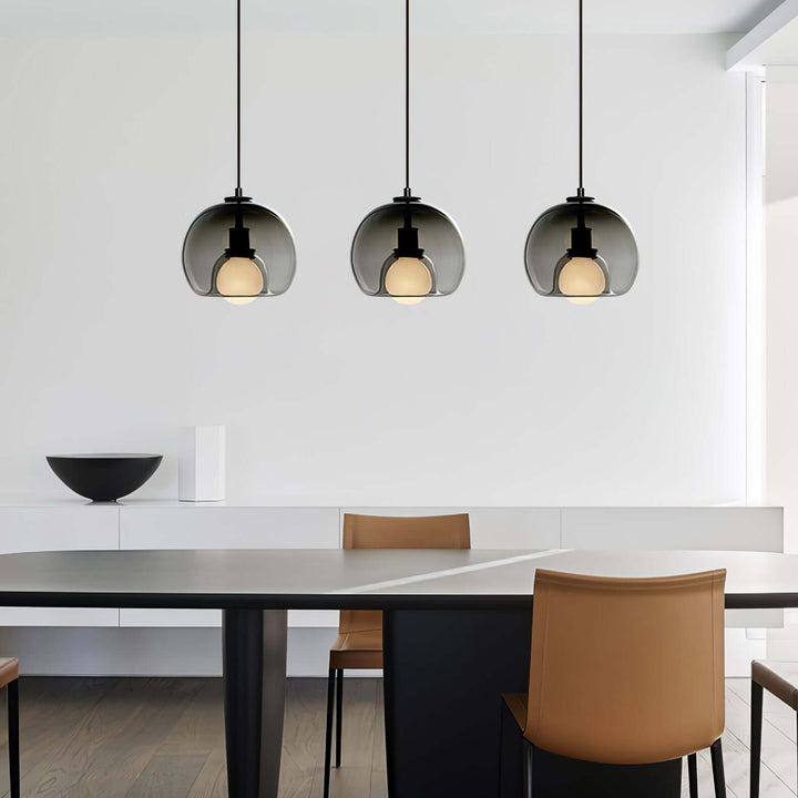 Moderne pendellampe i metal og glas