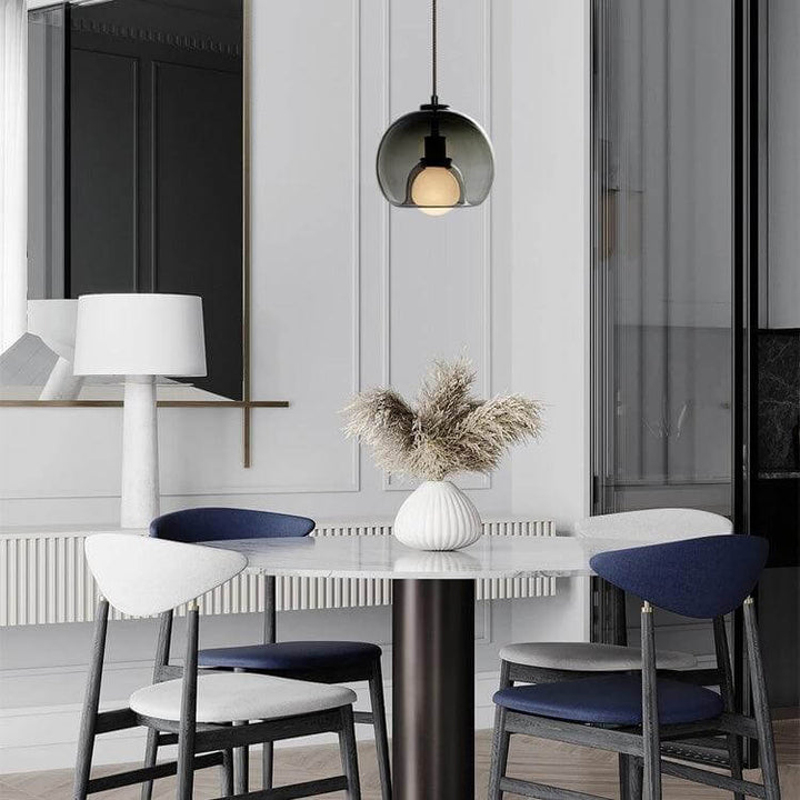 Moderne pendellampe i metal og glas
