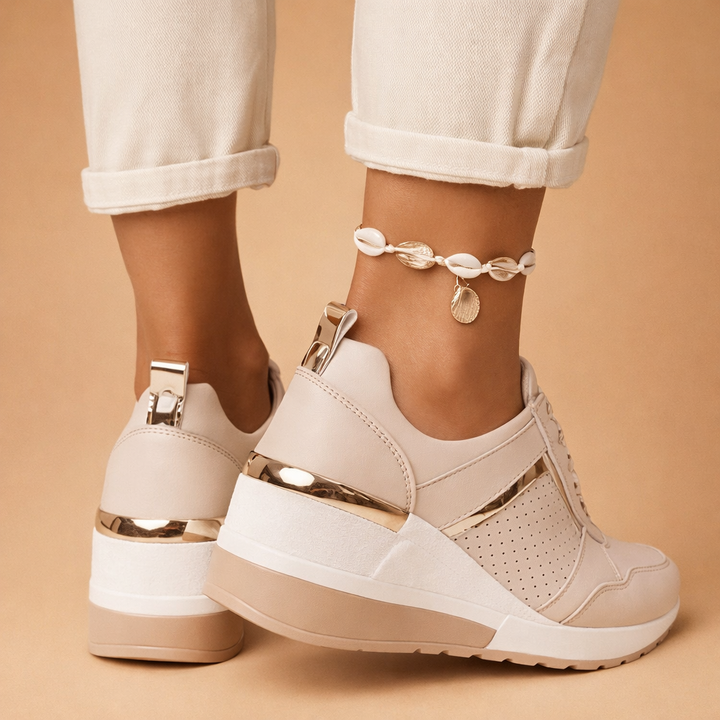 Moderne dame platform sneakers, fås i forskellige farver, giver diskret højde og stilfuld komfort.