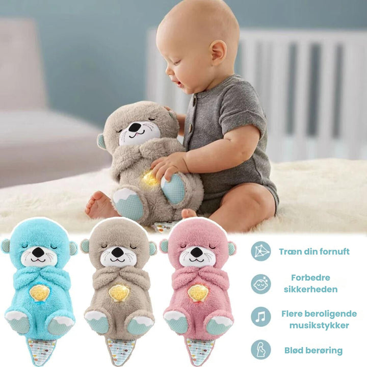 Beroligende nussebamse odder til baby. Blød sovebamse plysdyr for tryghed og søvn.