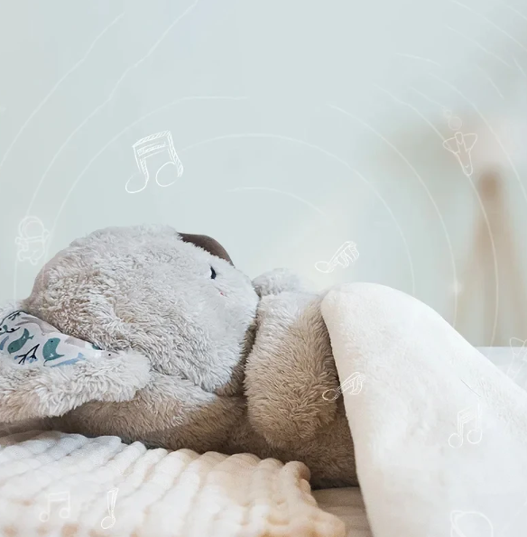 Beroligende koala-åndedrækslegetøj til børn, simulerer åndedrætsbevægelse, blide farver og integreret natlys.