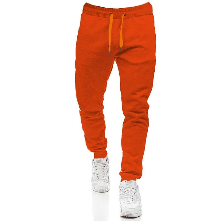 Grå herre joggingbukser med snøre i taljen, perfekte til afslappet hverdag og fritid, komfortable sweatpants.