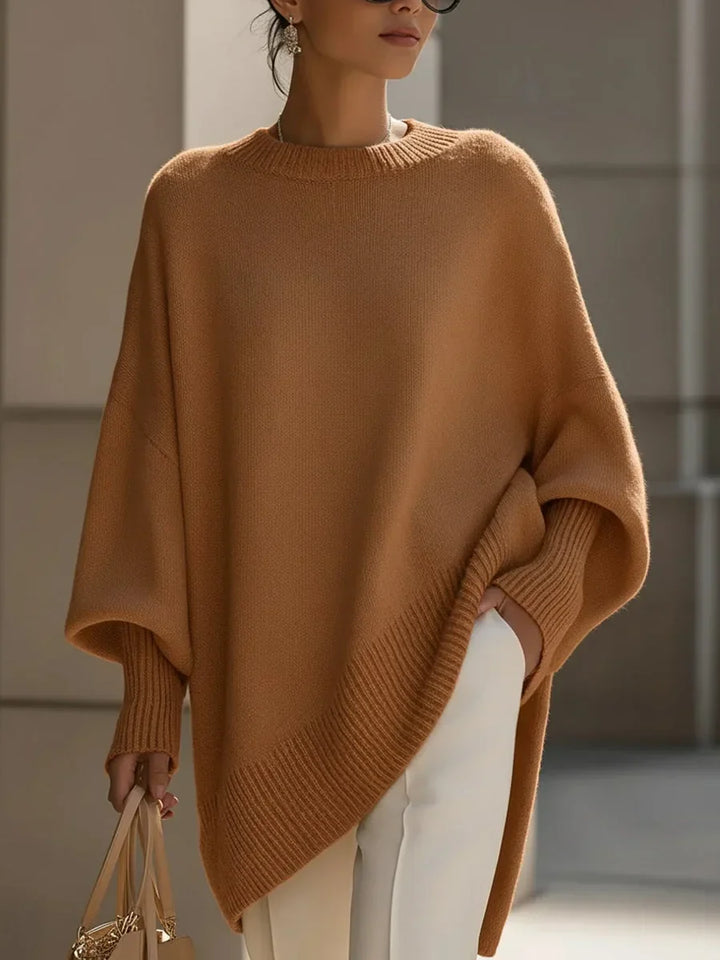 Dame oversized striktrøje i blød merinould. Komfortabel med rund hals, ideel til kølige dage.