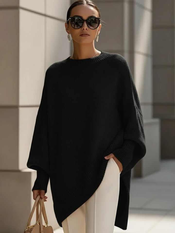 Casual oversized damestriktrøje i blød merinould. Rund hals design til både hverdag og afslapning.