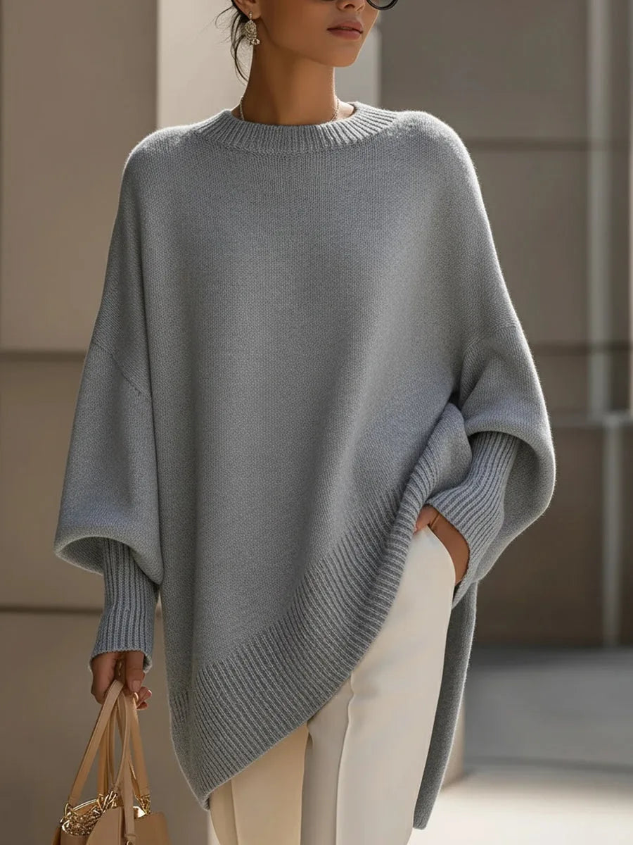 Åndbar og varm oversized striktrøje i merinould til damer. Rund hals, perfekt til efterårsbrug.