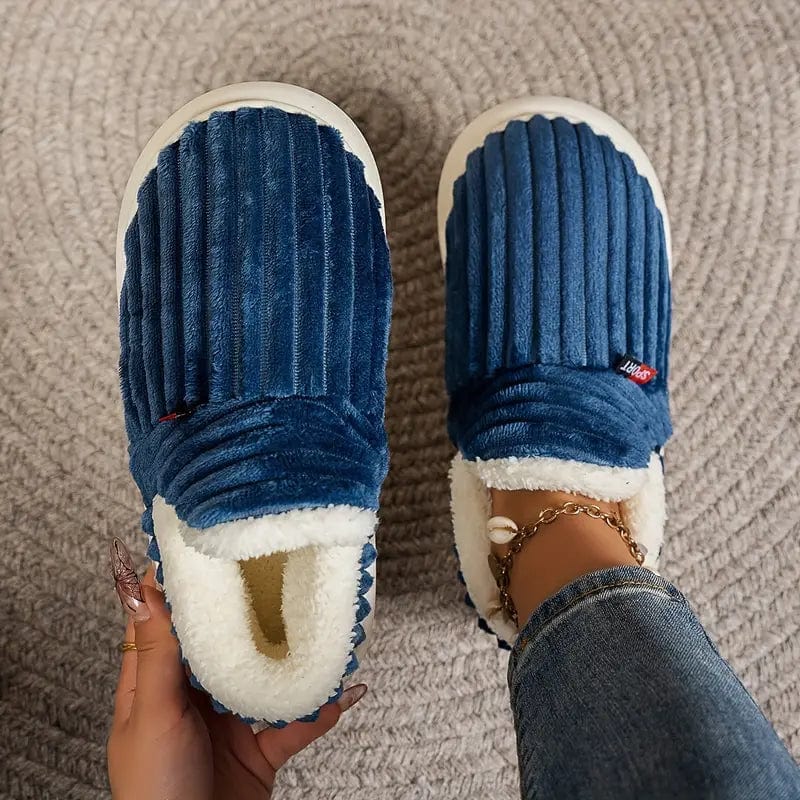 Bløde, varme unisex hjemmesko. Skridsikker sål til komfortabel indendørs/udendørs brug.