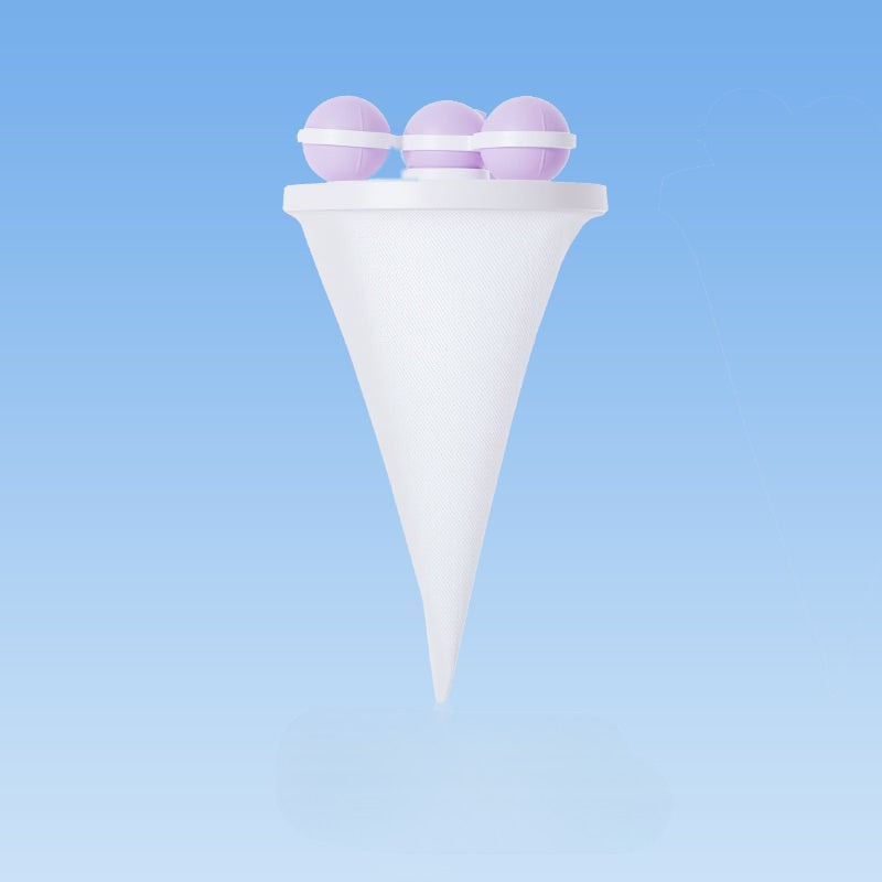 En blå fnugfanger designet til at fange fnug og hår effektivt, for at sikre optimal renhed af vasketøj.