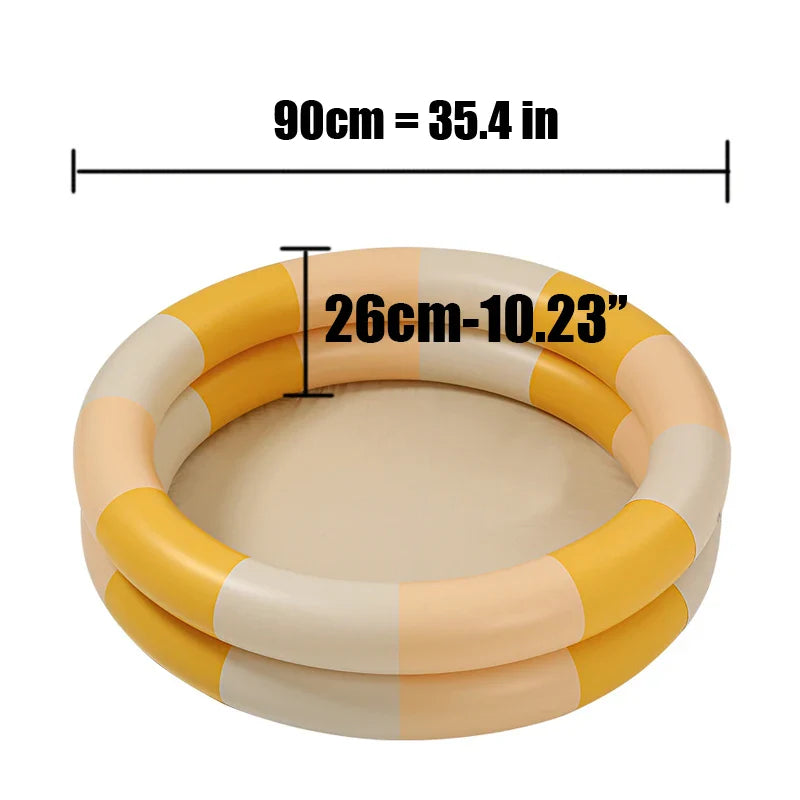 Farverig oppustelig pool med børnevenlige designs, perfekt til sikker vandsjov om sommeren i haven eller på stranden.