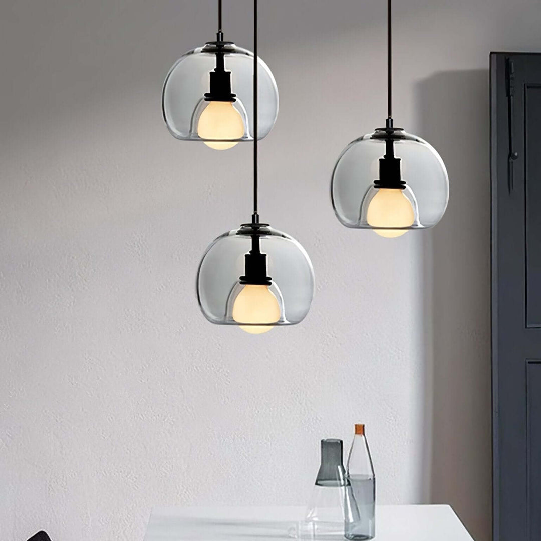 Moderne pendellampe i metal og glas