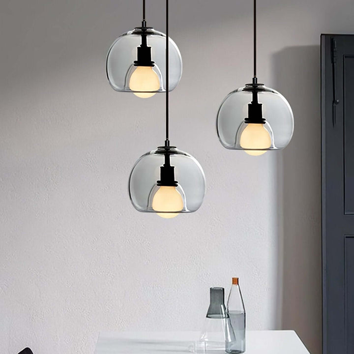 Moderne pendellampe i metal og glas