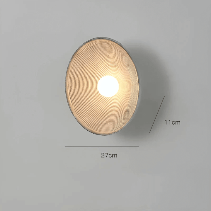 Rund LED væglampe i harpiks og glas med moderne design