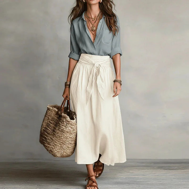 Elegant dame tosætssæt med skjortebluse og midi nederdel. Perfekt forårssæt og sommersæt for afslappet elegance.