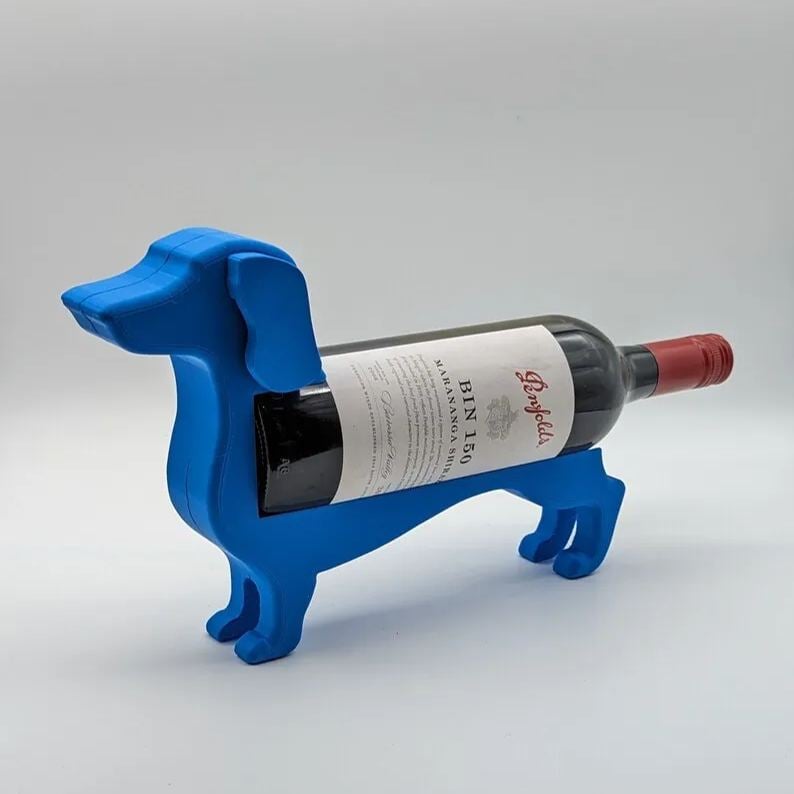 Gravhund vinflaskeholder i gul farve